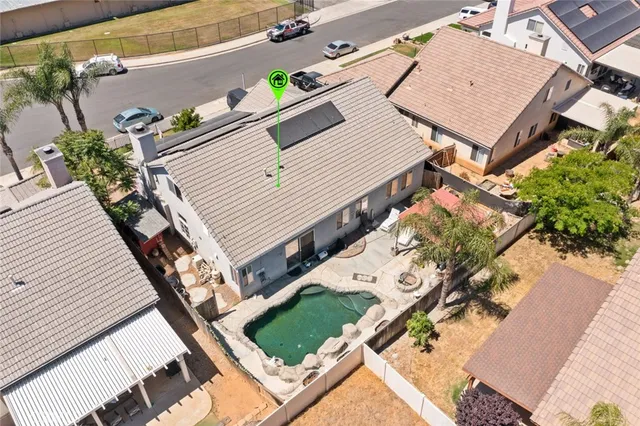 an aerial view of a house with a terrace