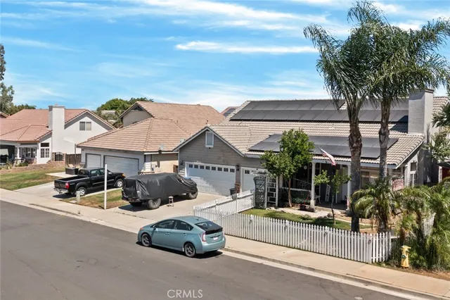 a car parked in front of a house