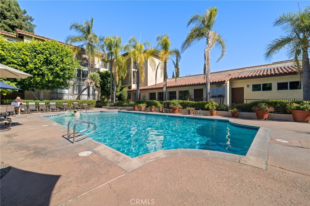 12830 Burbank Boulevard, Unit 307 Valley Village, CA 91607 - Photo 19 of 25 a view of a yard and a patio