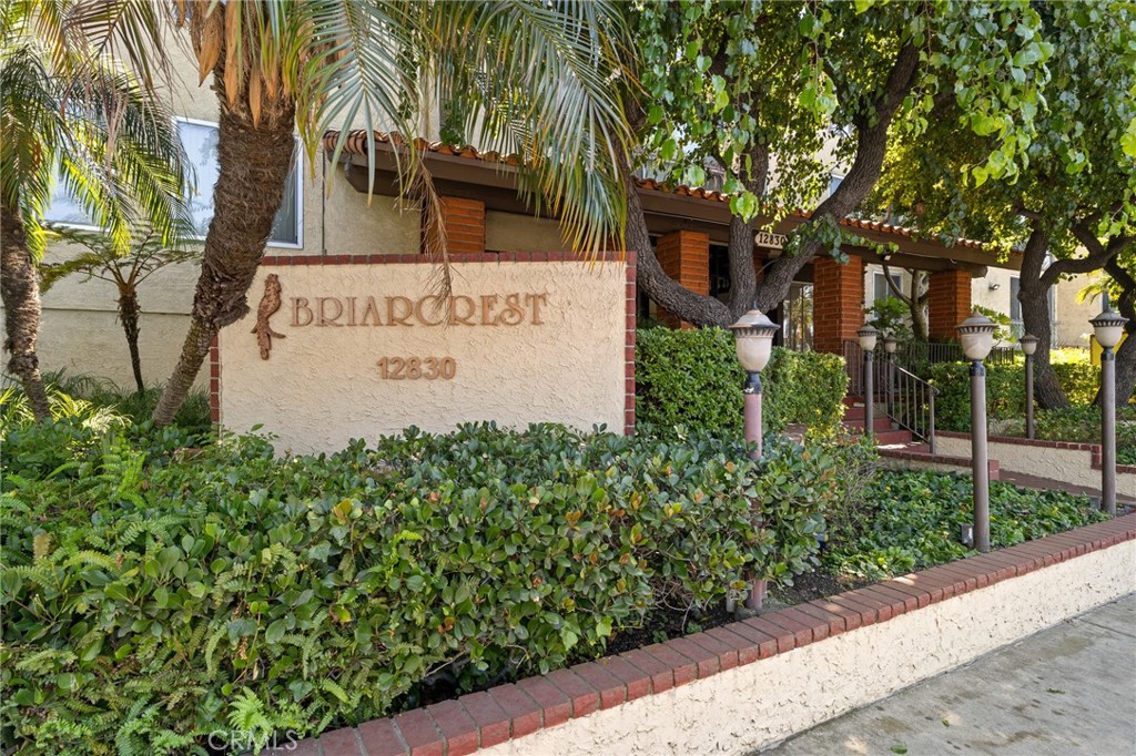 12830 Burbank Boulevard, Unit 307 Valley Village, CA 91607 - Photo 20 of 25 a sign on the side of a building