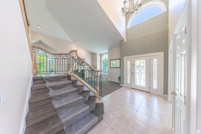 144 Bountiful Boulevard Bountiful, UT 84010 - Photo 13 of 28 Entryway featuring light tile patterned flooring and a high ceiling
