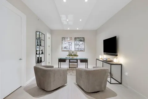 a bathroom with a double vanity sink and mirror