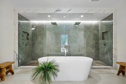 a view of a swimming pool and a yard