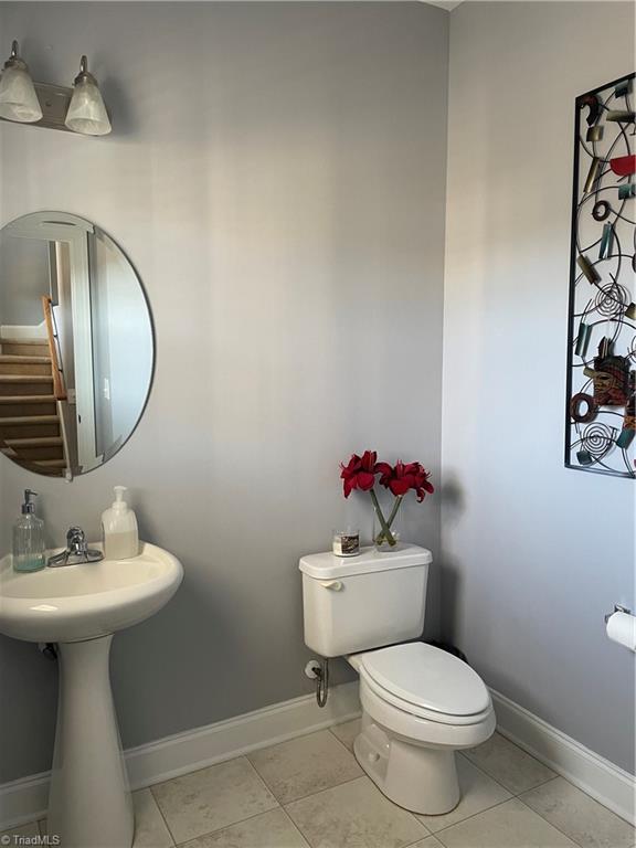 715 Ralph Graham Drive Graham, NC 27253 - Photo 19 of 44 Half bath on 1st floor