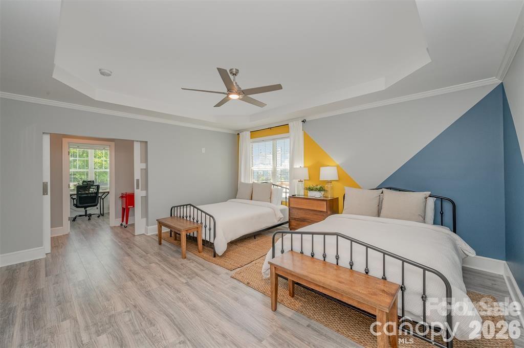 203 State Street Charlotte, NC 28208 - Photo 11 of 13 a bedroom with furniture and a window