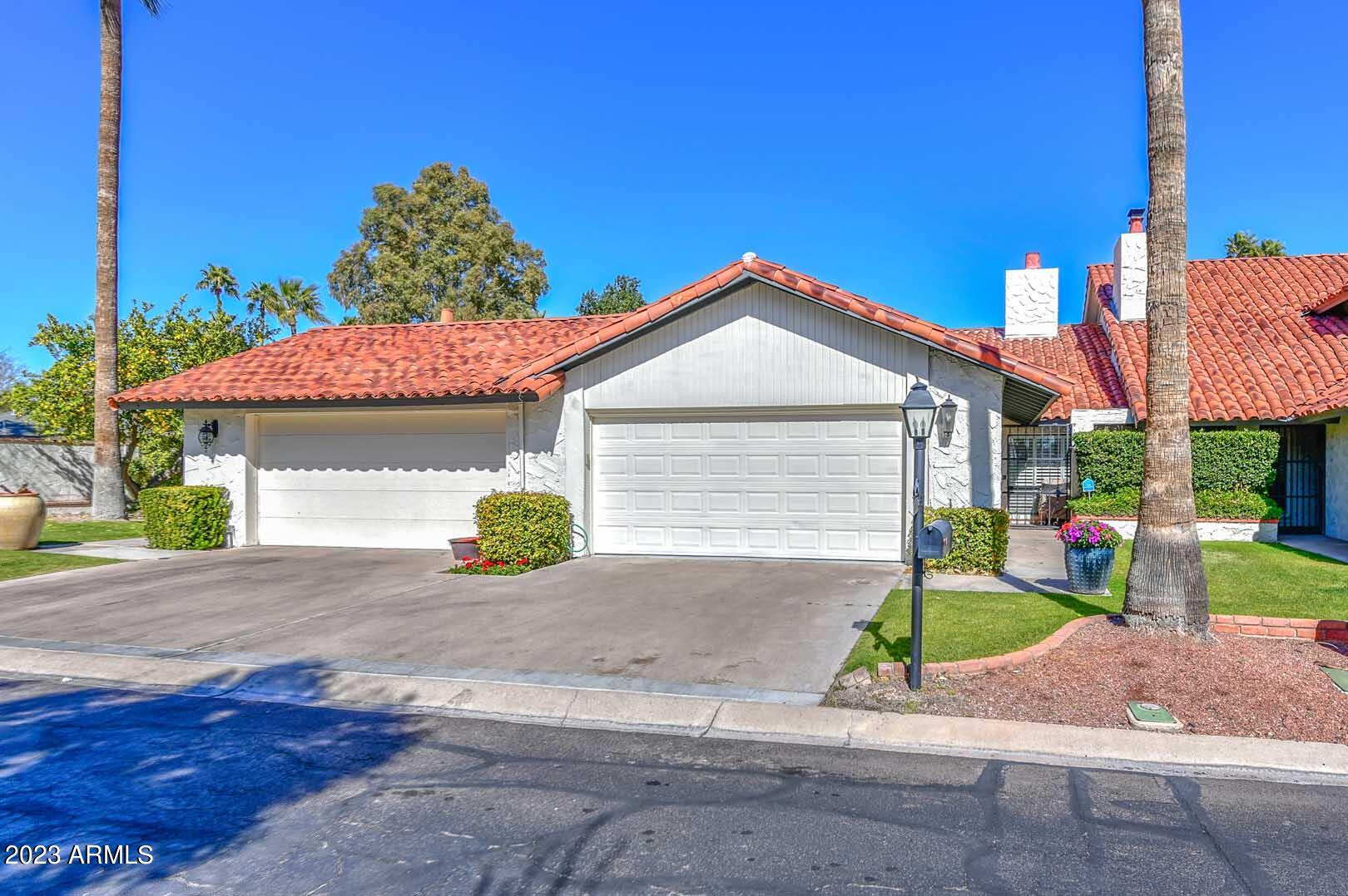 5804 North Scottsdale Road Paradise Valley, AZ 85253 - Photo 2 of 42 a view of outdoor space yard and front view of a house