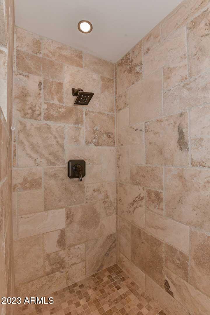 5804 North Scottsdale Road Paradise Valley, AZ 85253 - Photo 26 of 42 a bathroom with a shower