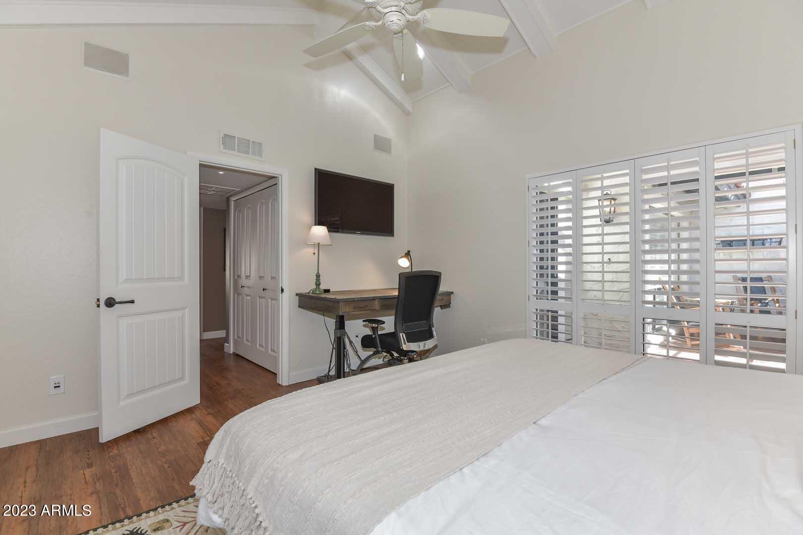 5804 North Scottsdale Road Paradise Valley, AZ 85253 - Photo 35 of 42 a bedroom with a bed and a television