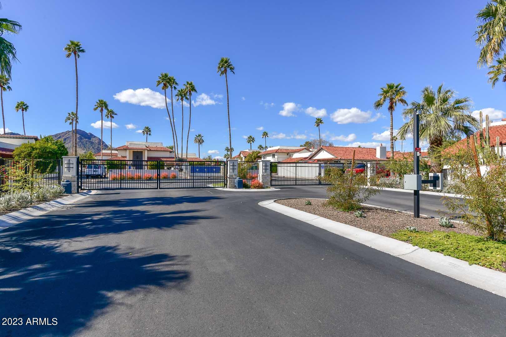5804 North Scottsdale Road Paradise Valley, AZ 85253 - Photo 38 of 42 a view of a street with palm trees