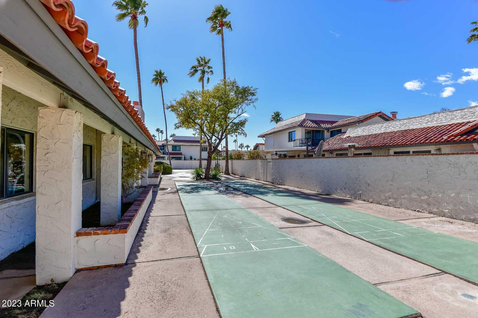 5804 North Scottsdale Road Paradise Valley, AZ 85253 - Photo 40 of 42 a view of a house with a street