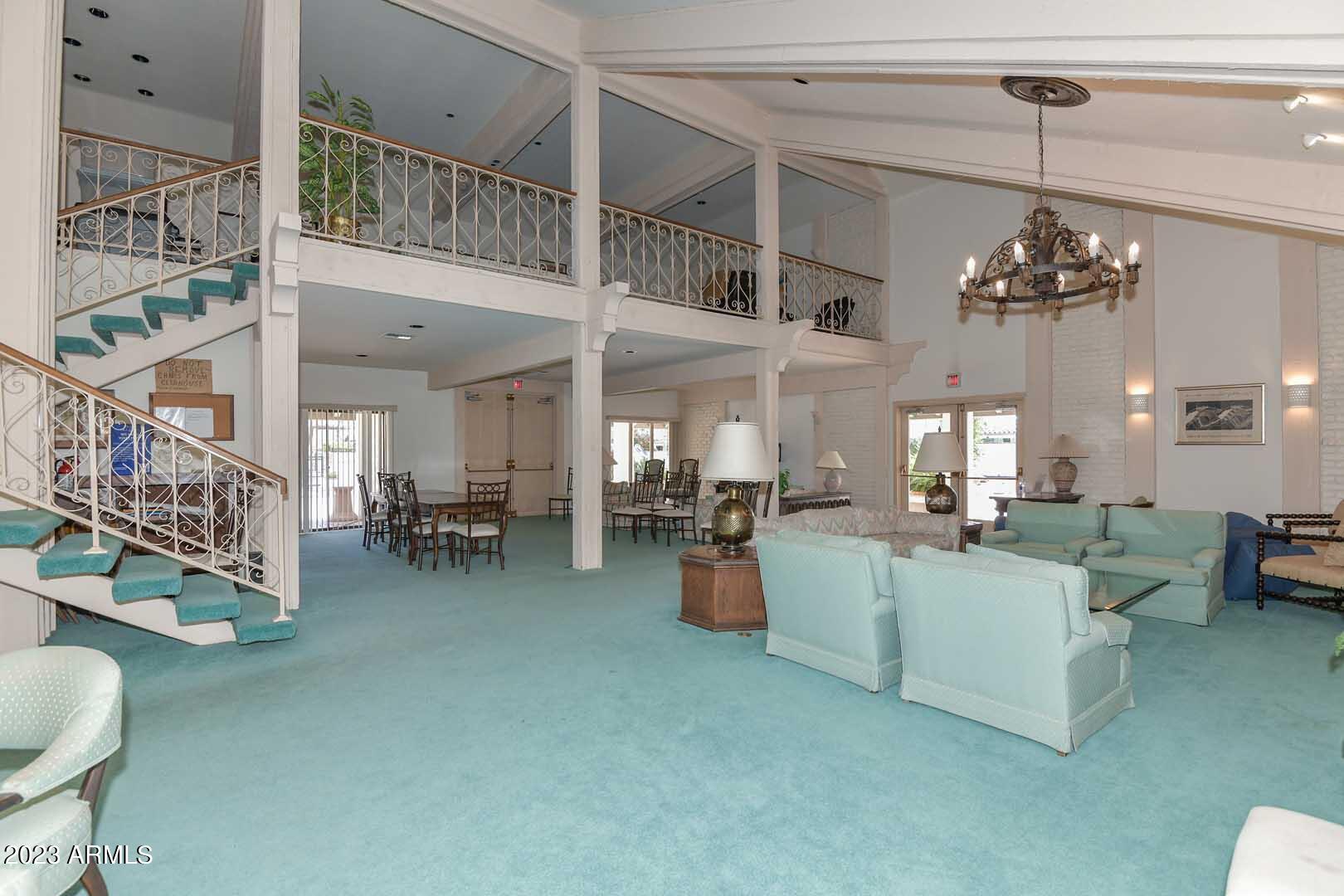 5804 North Scottsdale Road Paradise Valley, AZ 85253 - Photo 42 of 42 a living room with furniture and a chandelier