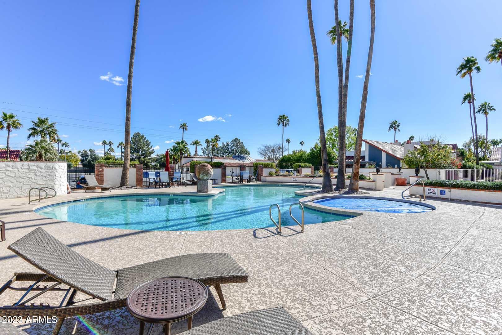 5804 North Scottsdale Road Paradise Valley, AZ 85253 - Photo 5 of 42 a view of swimming pool with outdoor seating