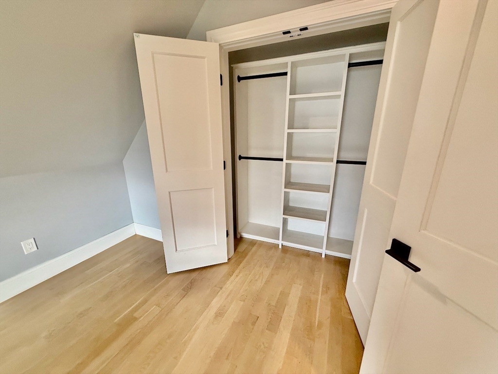 28 Dix Street, Unit 3 Boston, MA 02122 - Photo 11 of 34 a view of walk in closet with empty racks