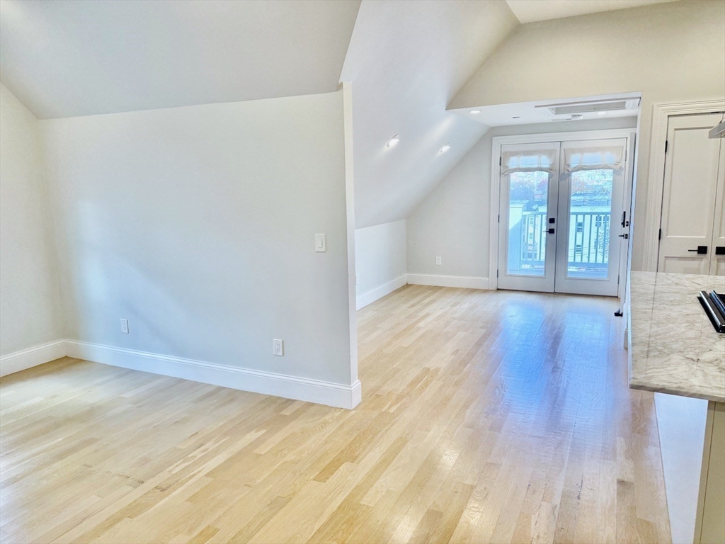28 Dix Street, Unit 3 Boston, MA 02122 - Photo 17 of 34 wooden floor in an empty room