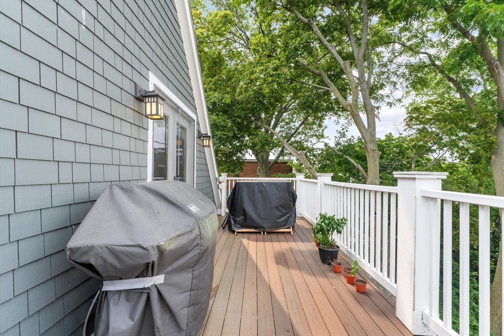 28 Dix Street, Unit 3 Boston, MA 02122 - Photo 27 of 34 a view of balcony with wooden floor and outdoor seating