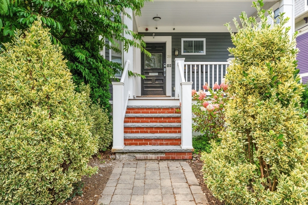 28 Dix Street, Unit 3 Boston, MA 02122 - Photo 29 of 34 a front view of a house with a garden