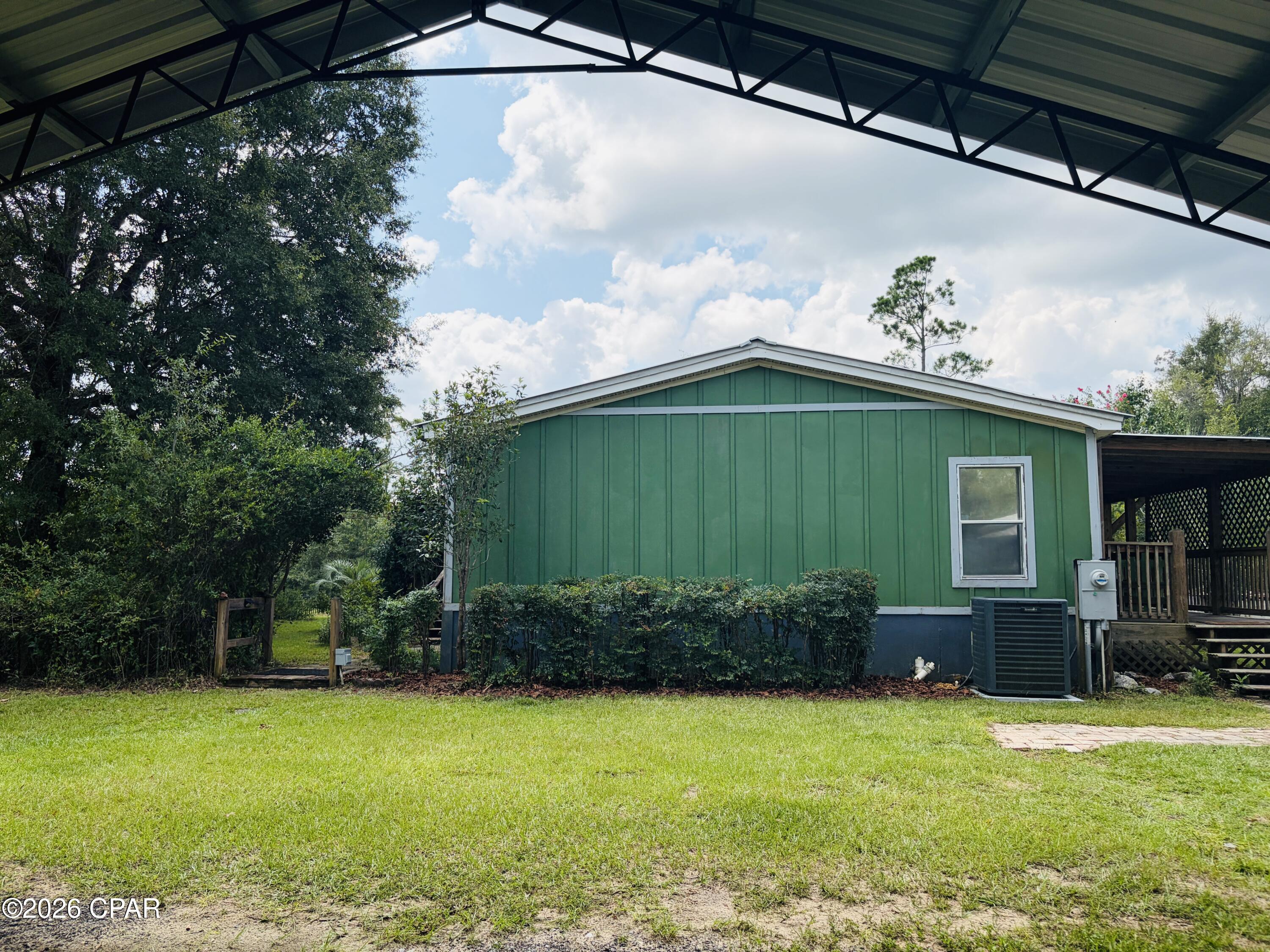8869 Northwest Felix Flanders Road Altha, FL 32421 - Photo 6 of 45 Gallery Image 6