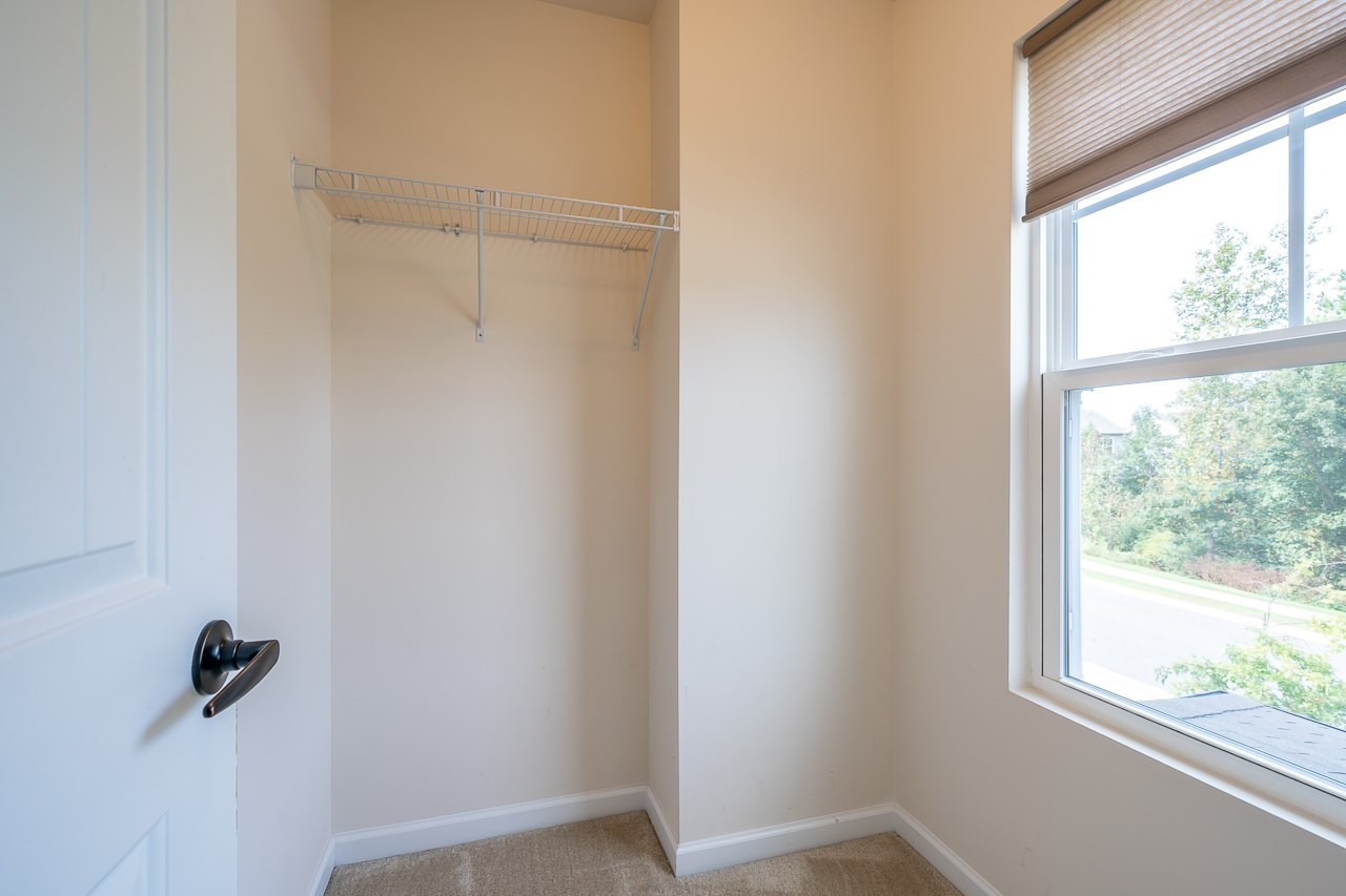 8116 Feldwig Place Raleigh, NC 27616 - Photo 20 of 30 Bedroom #2 walk-in closet