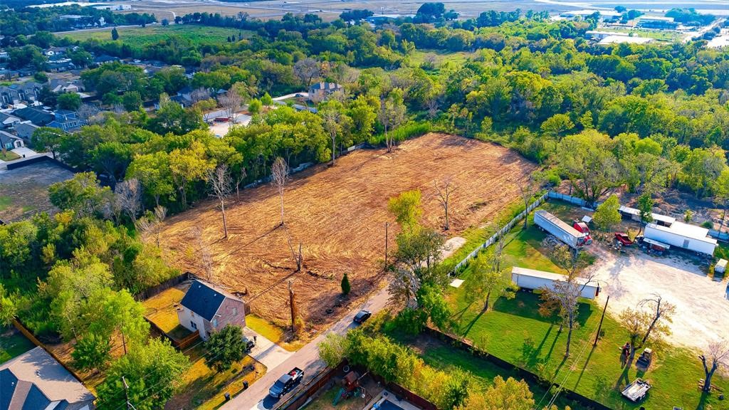 8888 Freeland Street Houston, TX 77075 - Photo 5 of 12 an aerial view of a house with a yard and garden