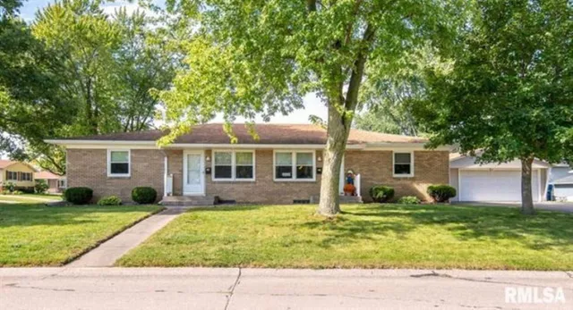 a front view of house with yard