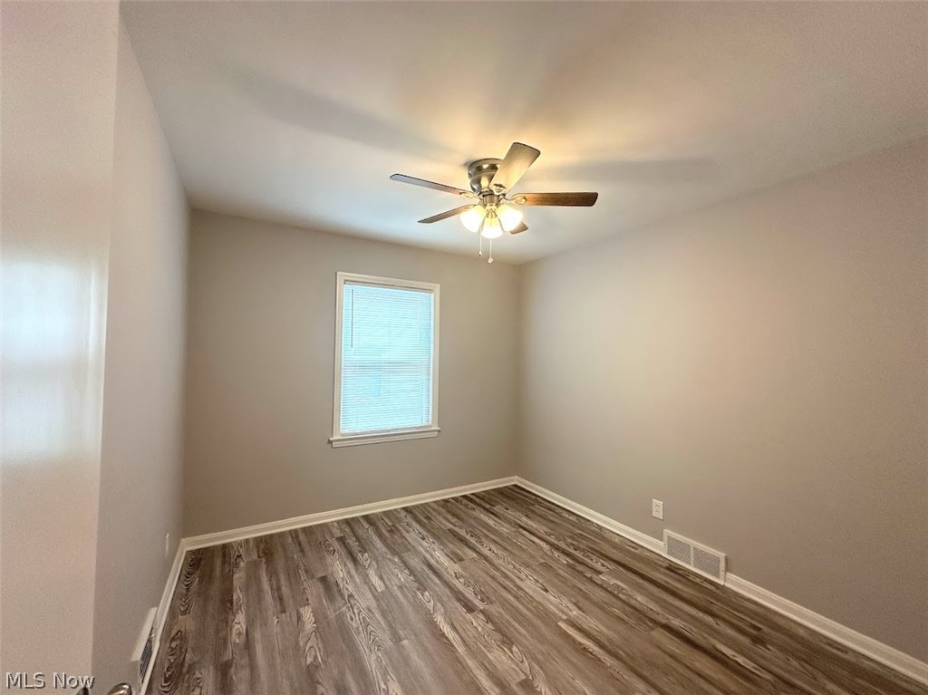 4227 Eastway Road South Euclid, OH 44121 - Photo 8 of 18 Spare room with ceiling fan and hardwood / wood-style floors