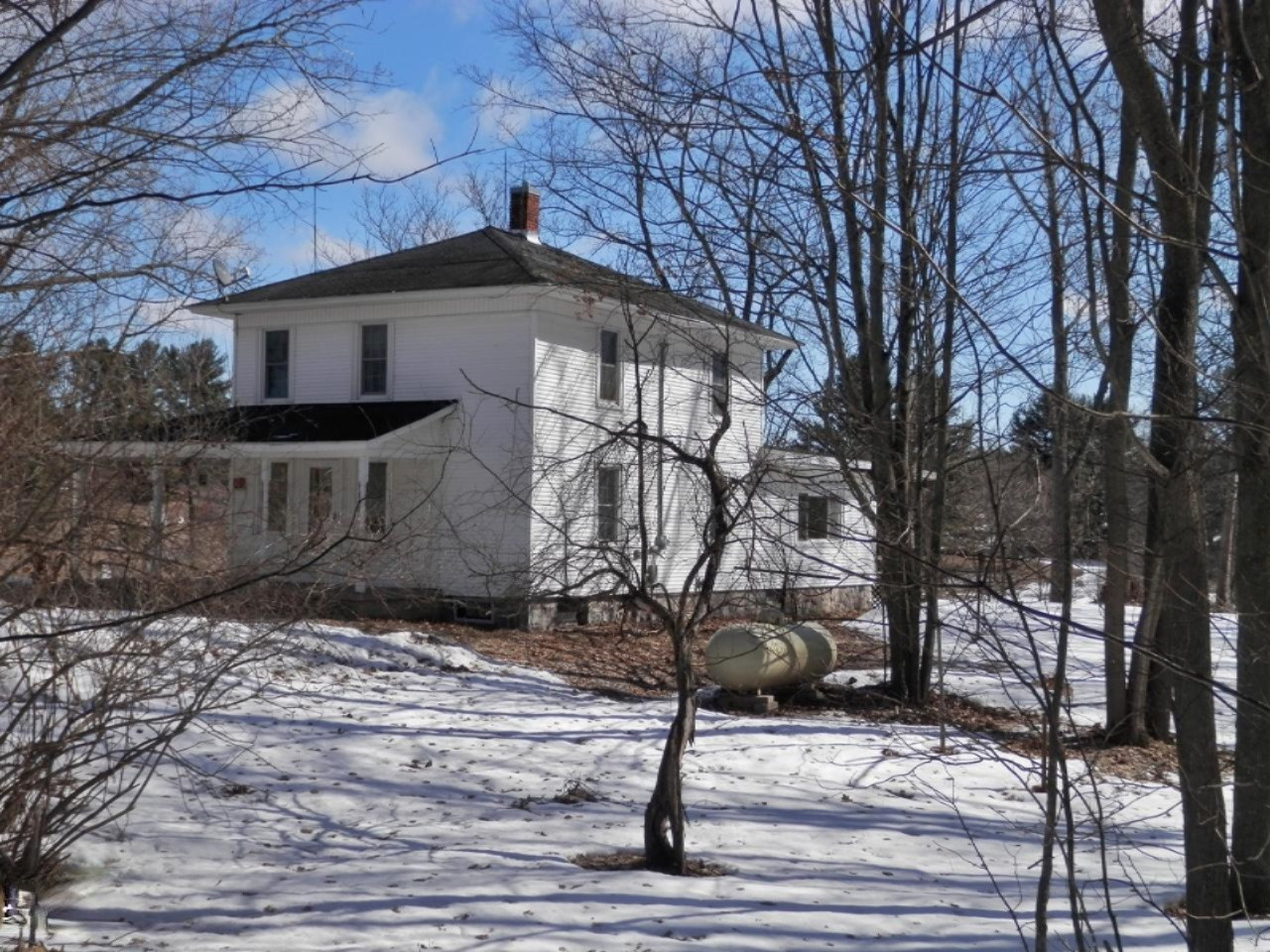 8790 Ruttan Road Northwest Alden, MI 49612 - Photo 1 of 43 Charming farmhouse set into the woods