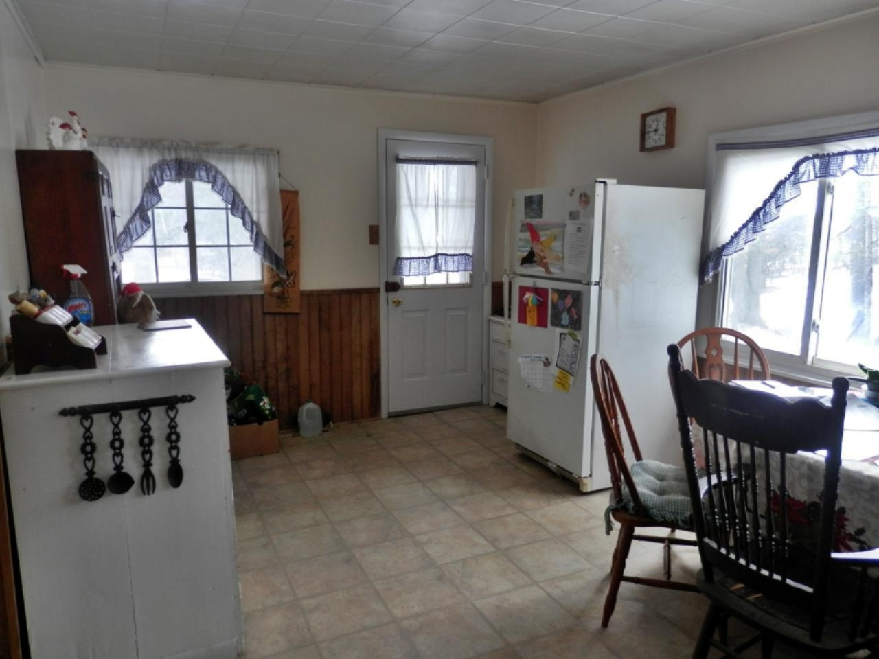 8790 Ruttan Road Northwest Alden, MI 49612 - Photo 11 of 43 Breakfast area has door leading outside