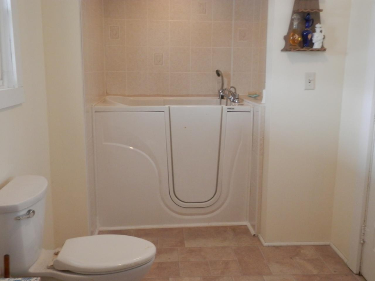 8790 Ruttan Road Northwest Alden, MI 49612 - Photo 13 of 43 Walk-in tub in full bath