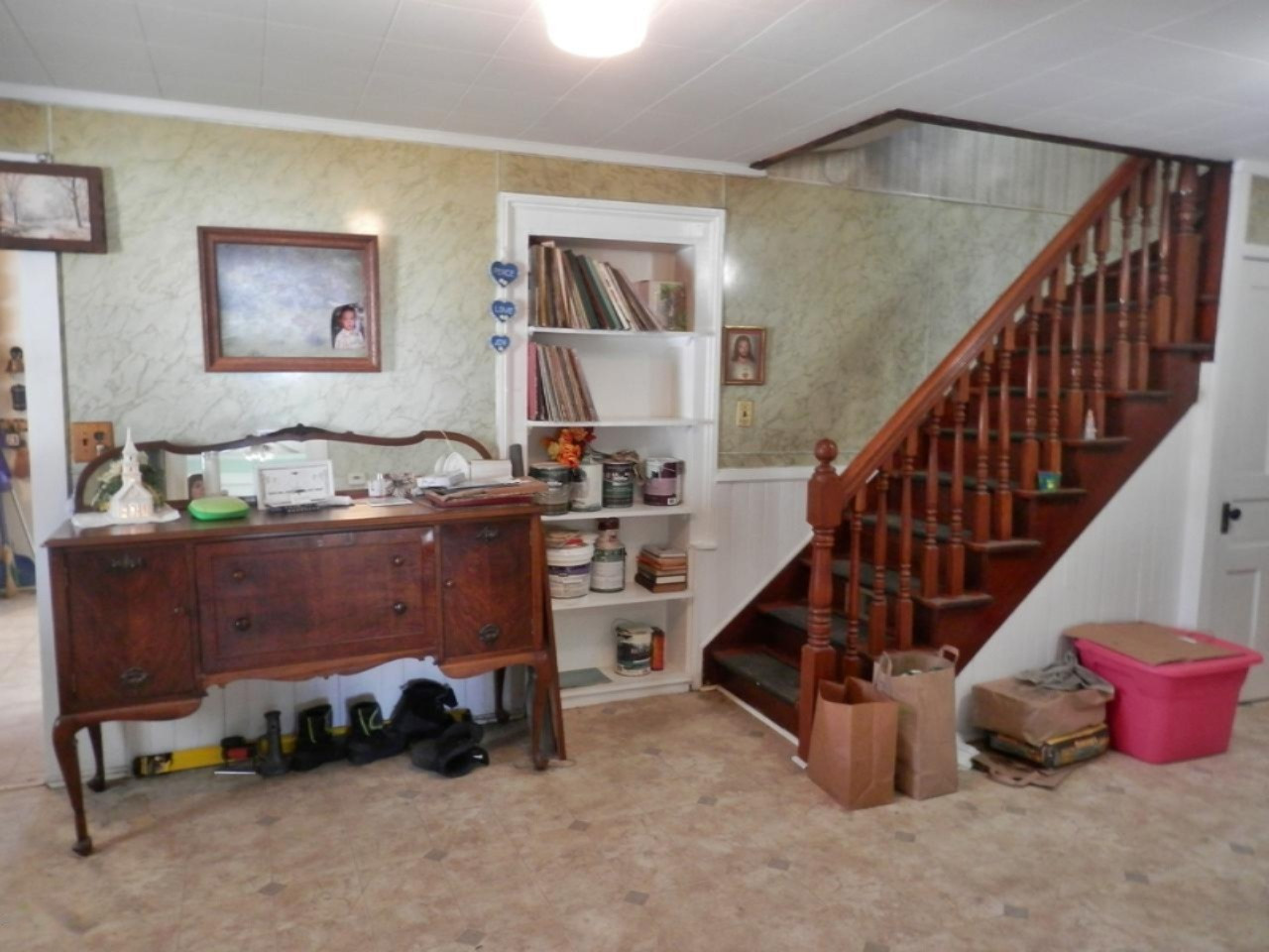8790 Ruttan Road Northwest Alden, MI 49612 - Photo 19 of 43 Open staircase and built-in bookcases