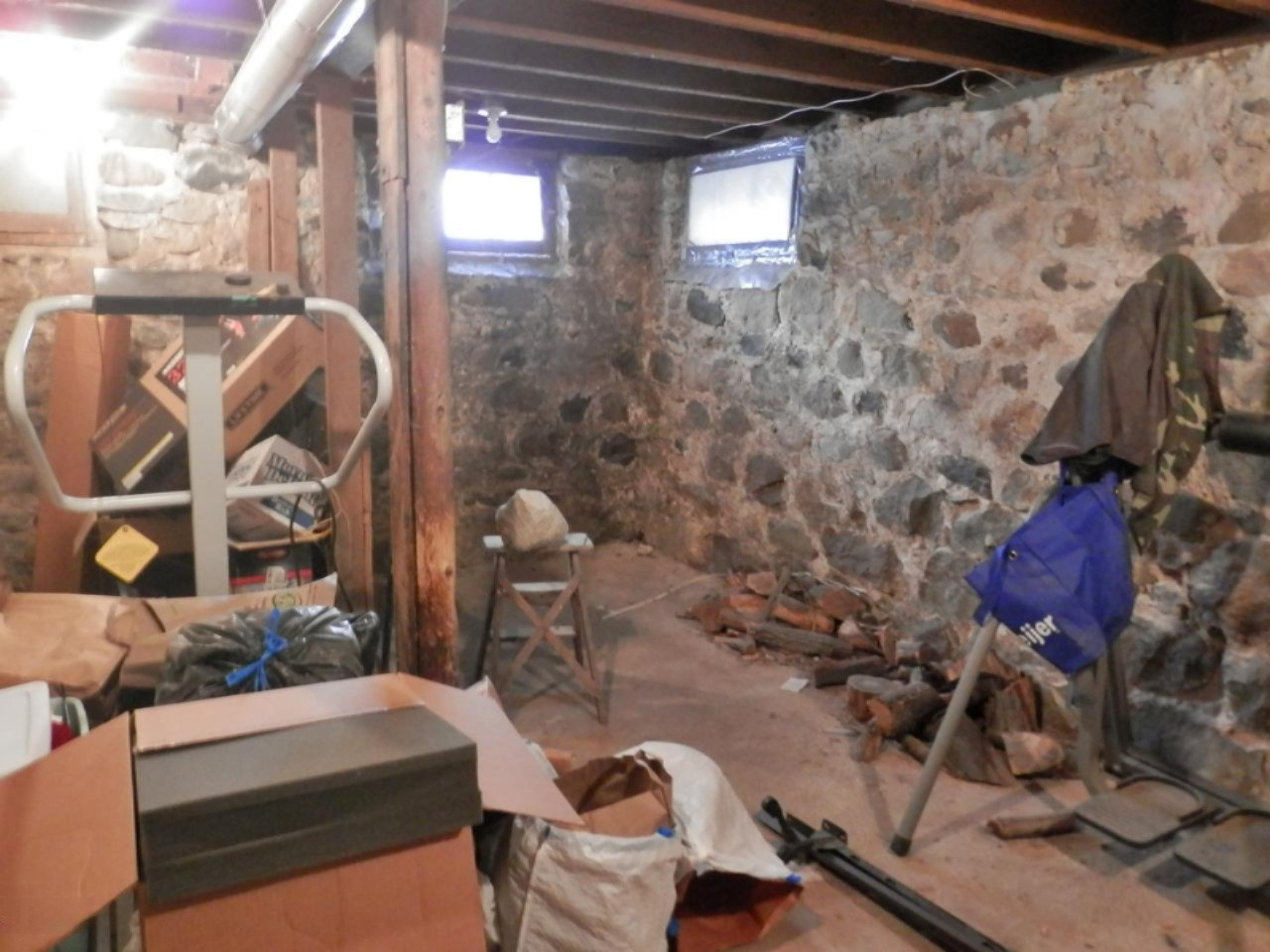 8790 Ruttan Road Northwest Alden, MI 49612 - Photo 26 of 43 Stone basement under part of the home