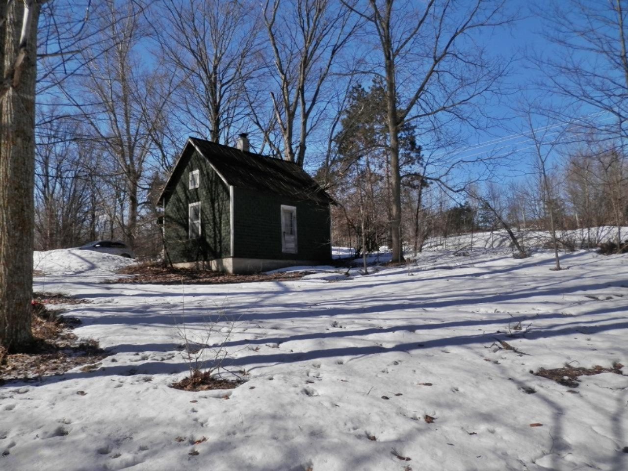 8790 Ruttan Road Northwest Alden, MI 49612 - Photo 28 of 43 Original homestead now used for storage