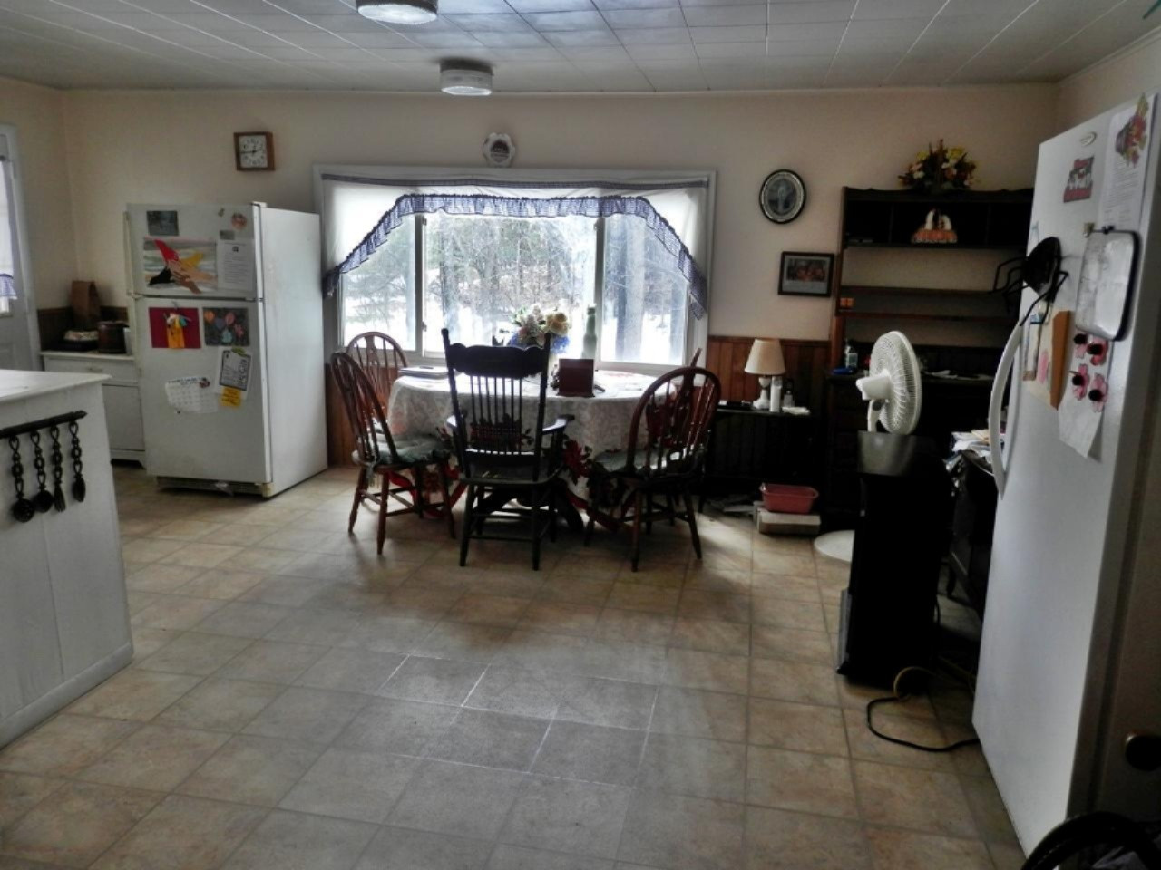8790 Ruttan Road Northwest Alden, MI 49612 - Photo 10 of 43 Large breakfast area adjoins kitchen