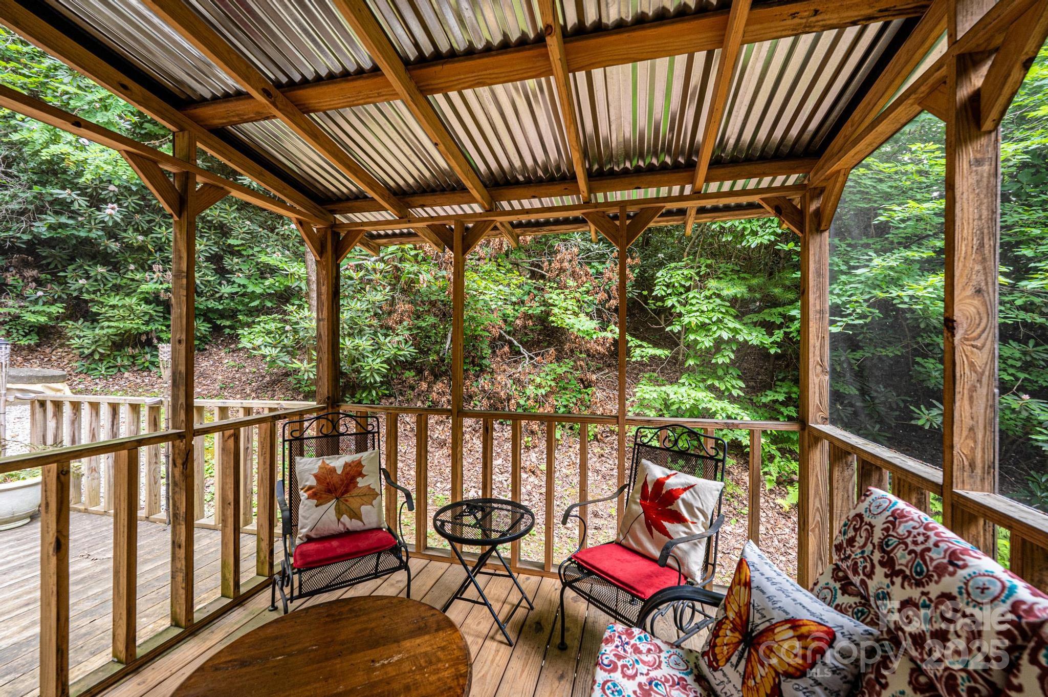 4462 Maple Grove Church Road Collettsville, NC 28611 - Photo 2 of 19 a view of a chairs in balcony
