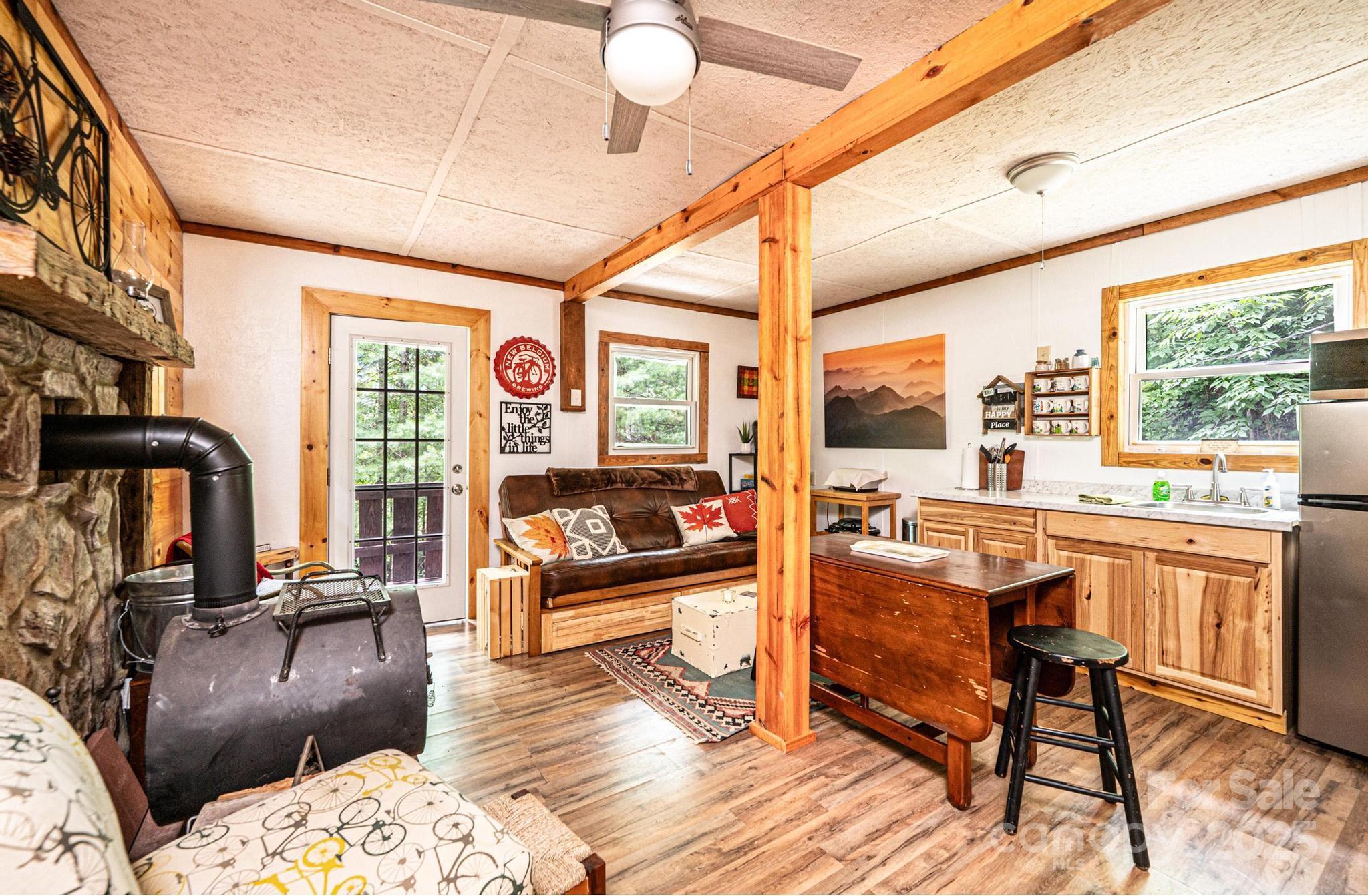 4462 Maple Grove Church Road Collettsville, NC 28611 - Photo 4 of 19 a living room with furniture and a large window