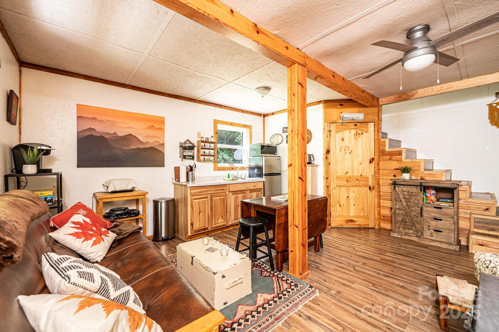 4462 Maple Grove Church Road Collettsville, NC 28611 - Photo 5 of 19 a view of a livingroom with furniture and workspace
