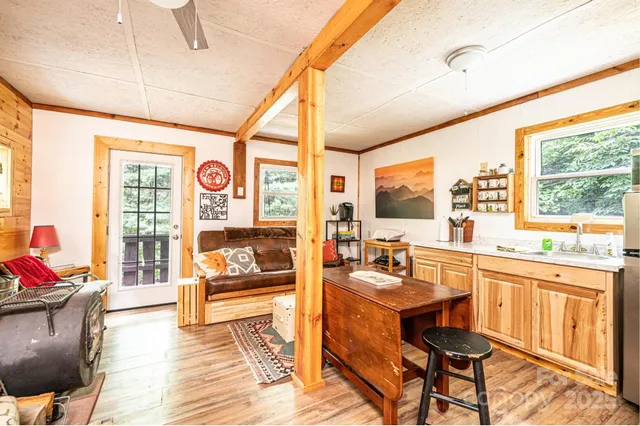 a very nice looking living room with a large window
