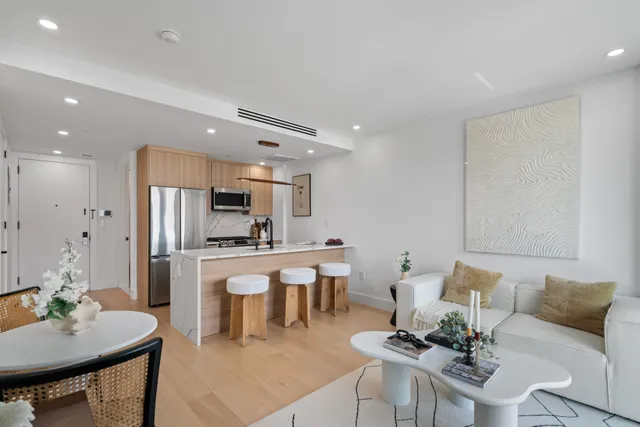 a view of a brick building with many windows