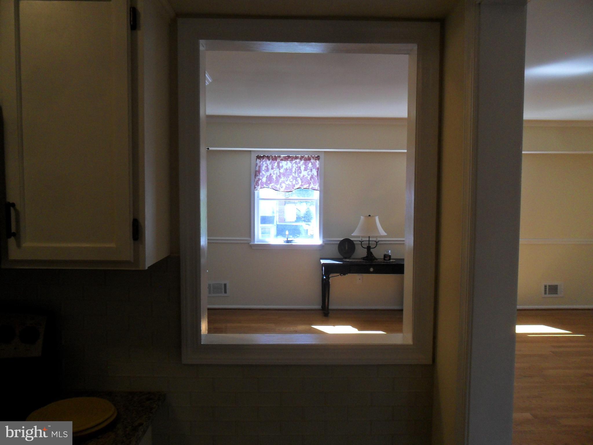 9 Delaware Street, Unit 9 New Castle, DE 19720 - Photo 13 of 28 a view of kitchen and window