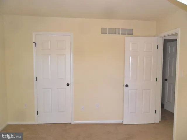 an empty room that has a window