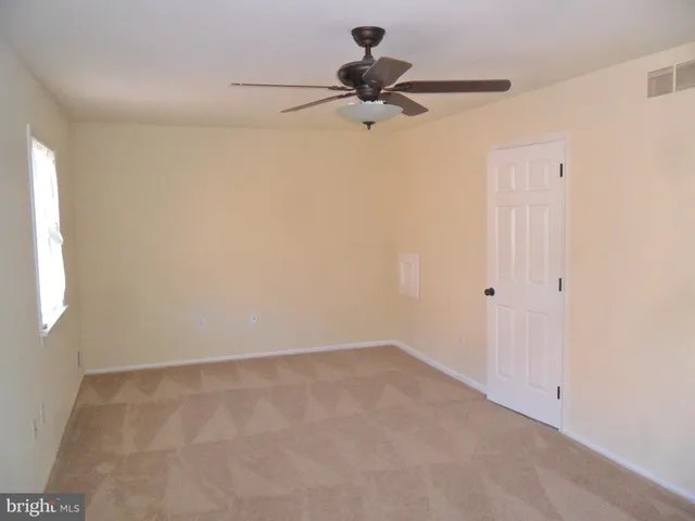 a view of a room with a window