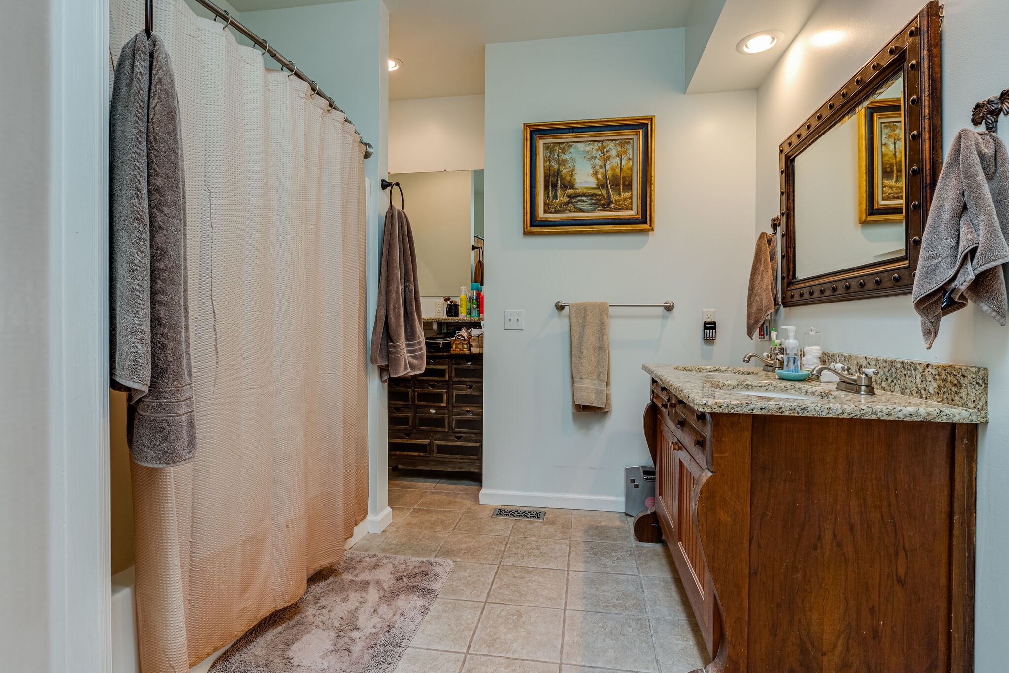 7107 Wells Cemetery Road Dickson, TN 37055 - Photo 20 of 59 a bathroom with a sink and a mirror