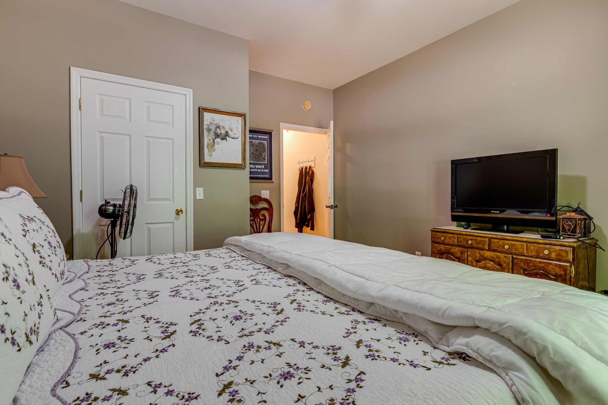 7107 Wells Cemetery Road Dickson, TN 37055 - Photo 25 of 59 a bedroom with a bed and a flat screen tv