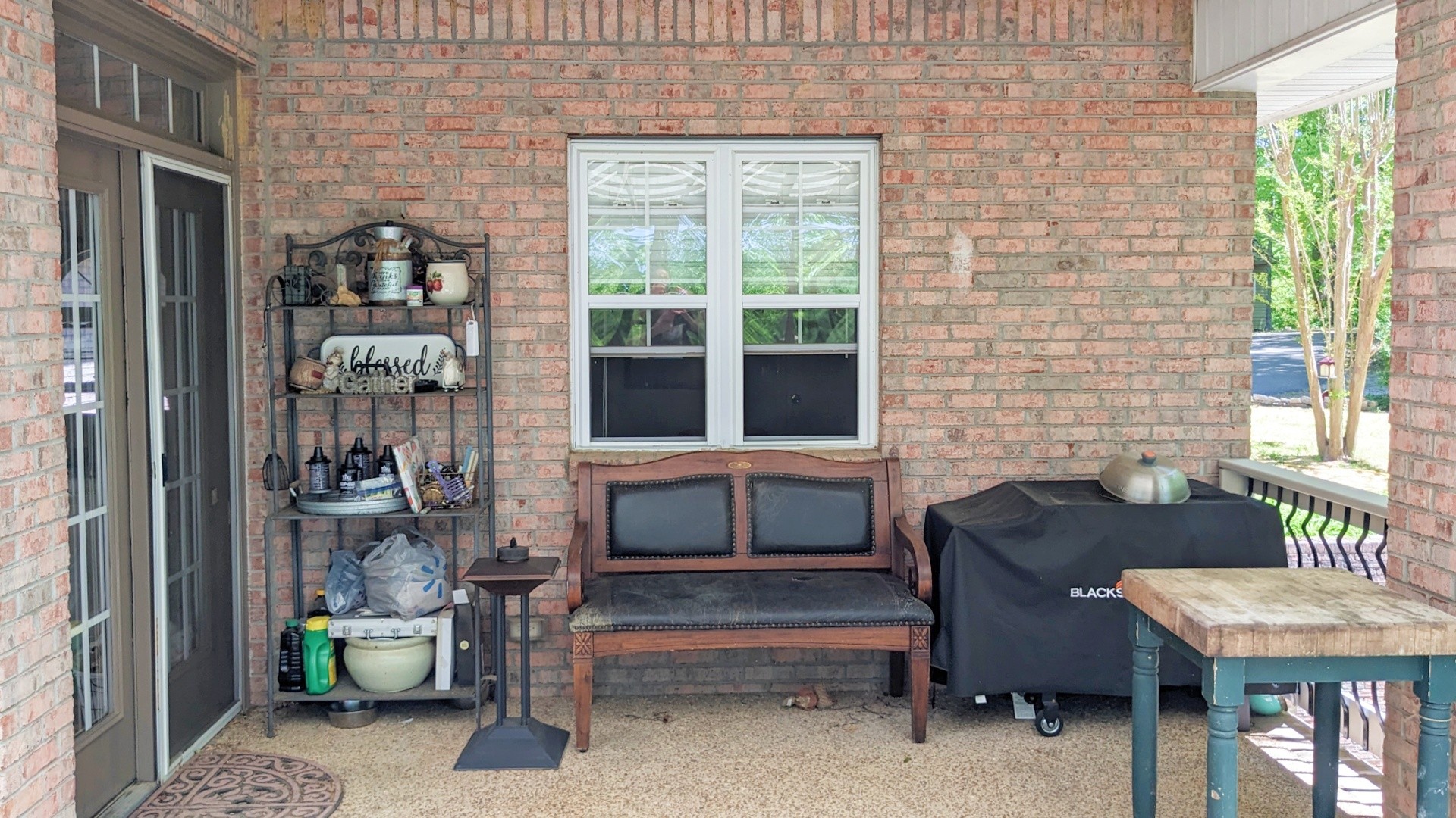 7107 Wells Cemetery Road Dickson, TN 37055 - Photo 30 of 59 a balcony with furniture and a potted plant