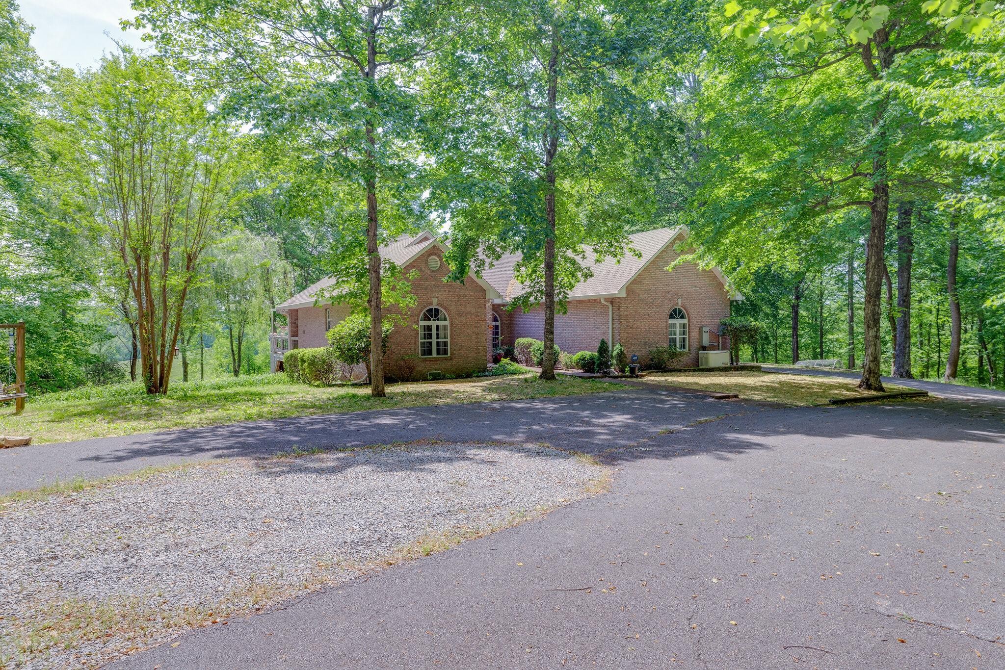 7107 Wells Cemetery Road Dickson, TN 37055 - Photo 59 of 59 a view of backyard of house with green space