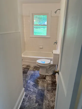 a bathroom with a sink and a toilet