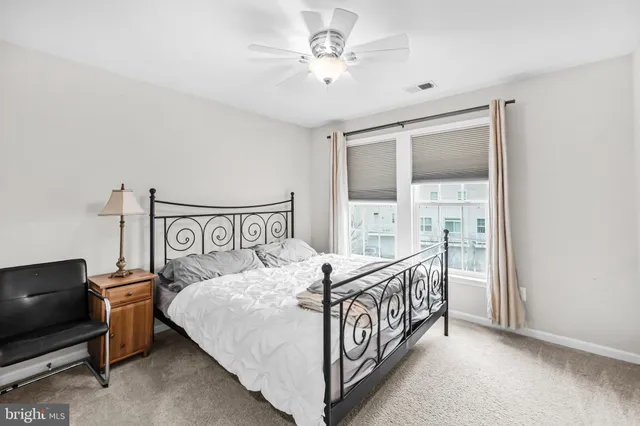a bathroom with a sink double vanity granite tub and shower