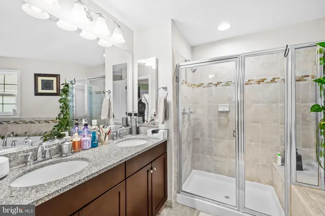 a view of a balcony with wooden fence