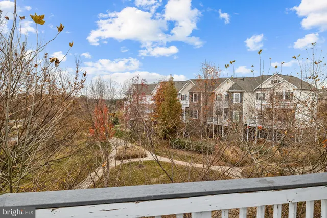 a utility room with sink dryer and washer