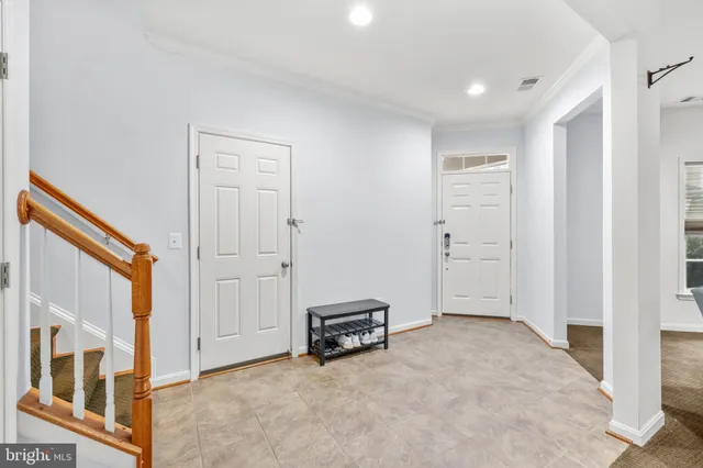 a view of a livingroom with a staircase