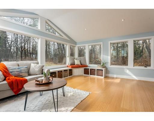 73 Woobly Road Bolton, MA 01740 - Photo 11 of 30 a living room with furniture and a large window